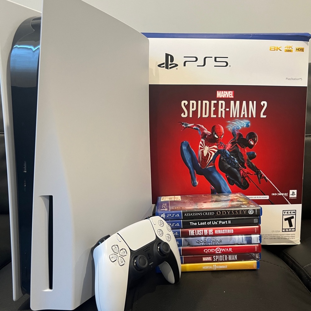 PS5 with 1 controller and 7 games